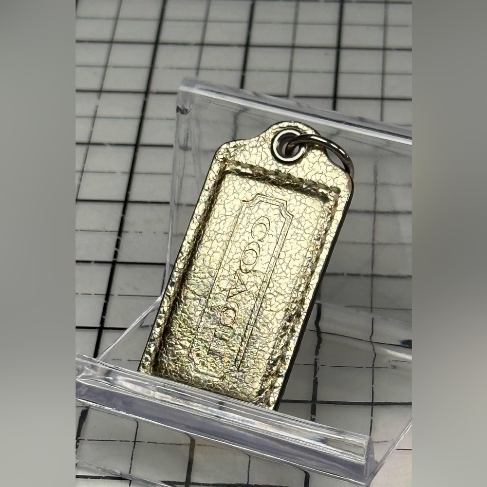 Coach metallic gold hand tag Keychain & chain.  Medium 2.5 x 1.25 inch.